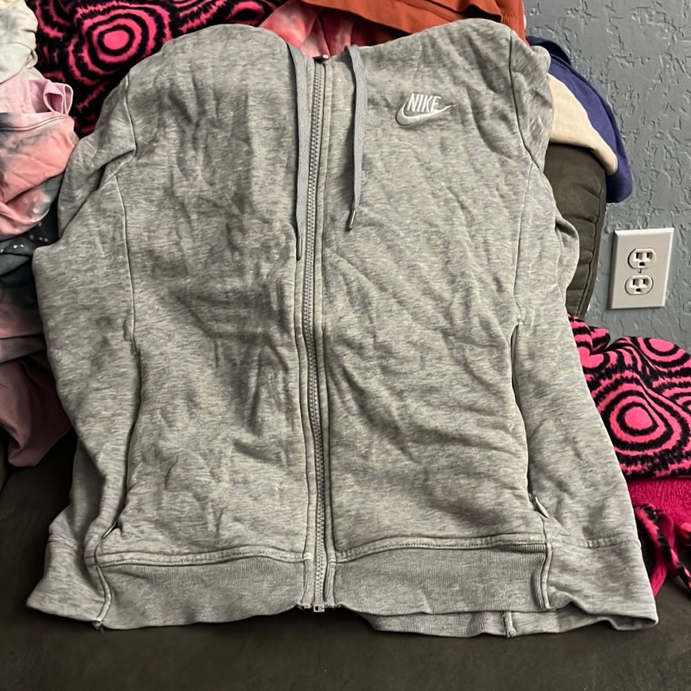 This is a cropped Nike sweater